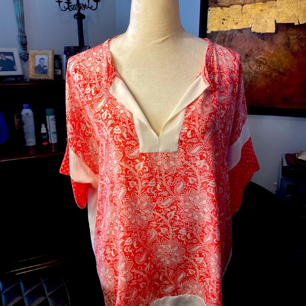 A perfect Peachy cream silky blouse.